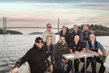 The factor10 team on a boat